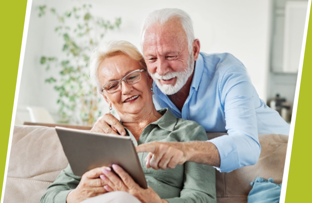 Senior couple reviewing retirement financial assessment on tablet at Sun Health At Home